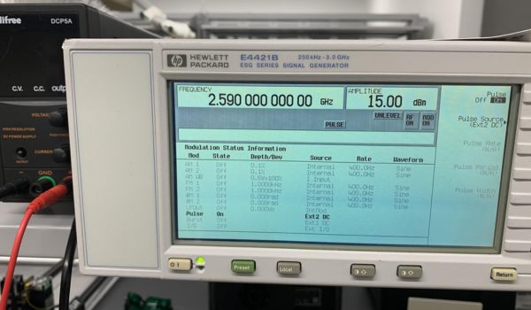 a Hewlett Packard signal generator displaying frequency